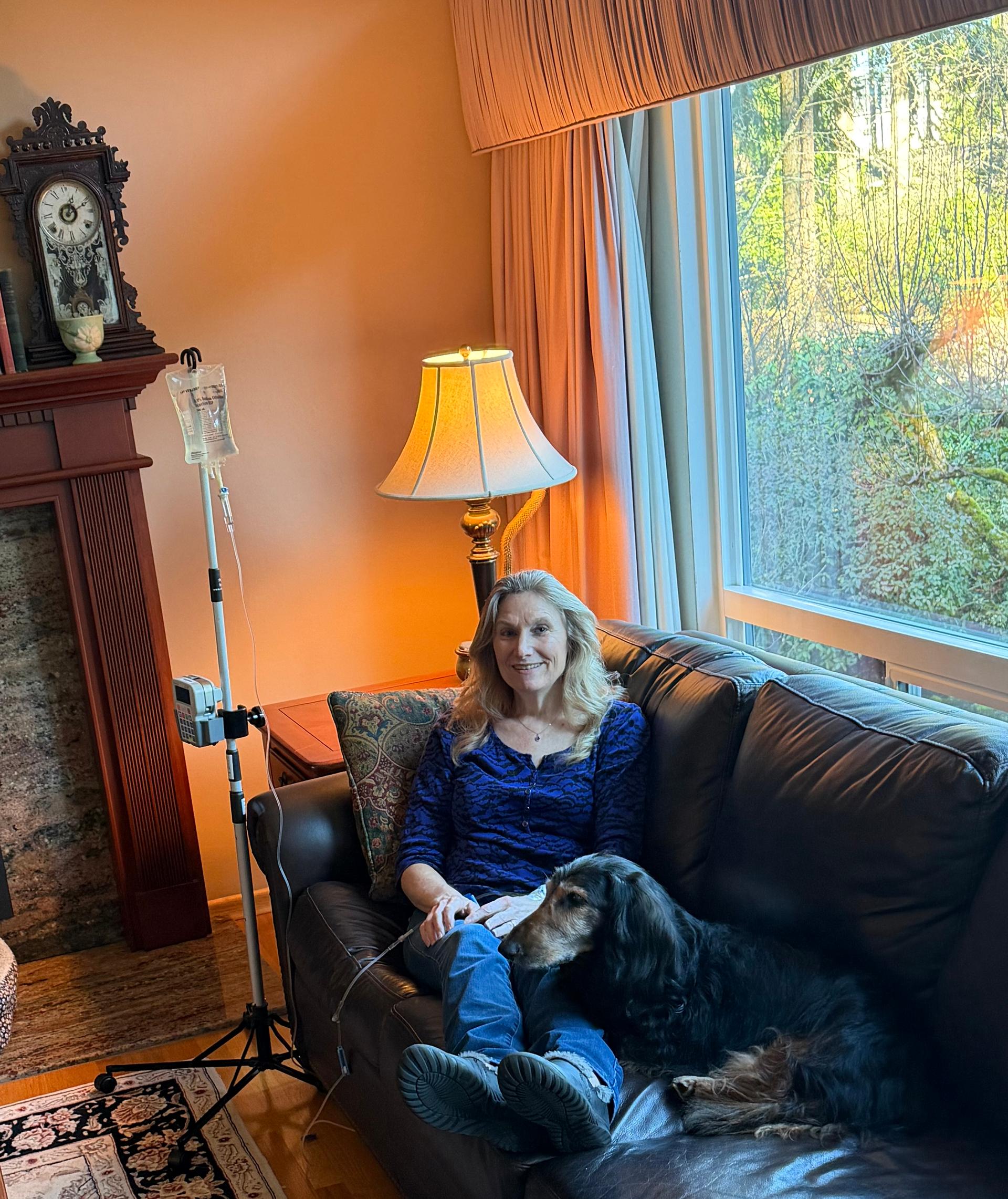 Nurse preparing infusion therapy for patient in their home